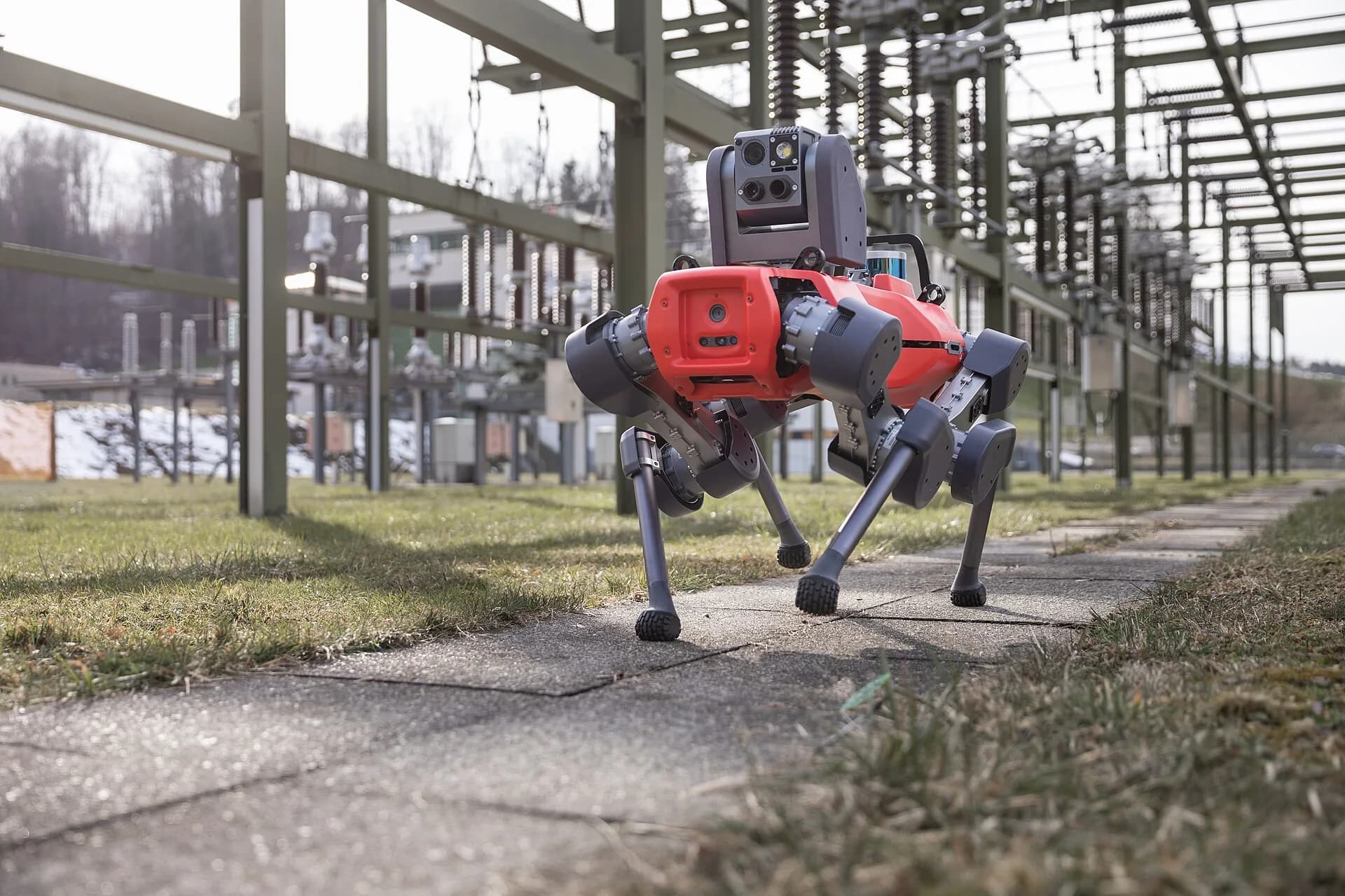 ANYmal D walking through an electrical substation during an inspection
